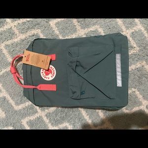 Green Fjallraven Kanken Backpack with pink accents. New with tags